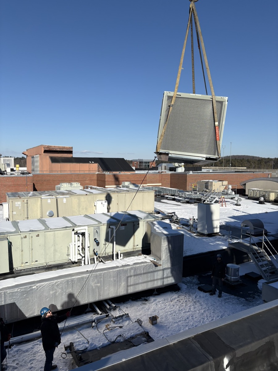 CSK Plumbing — crane work on a commercial job site