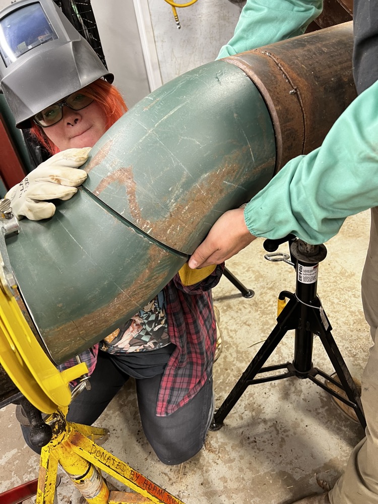 CSK Plumbing crew welding pipe